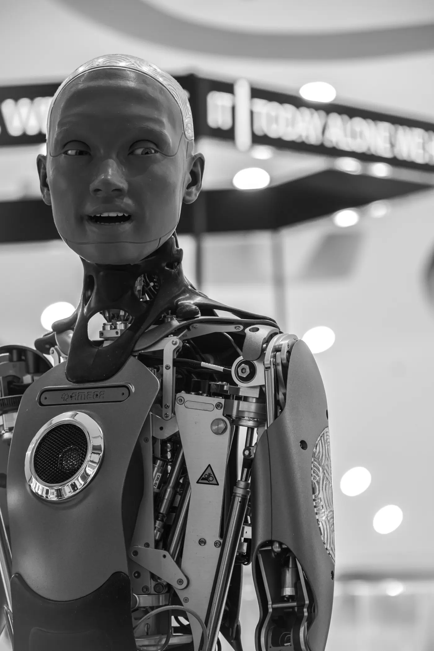 A close view of an advanced humanoid robot with visible mechanical parts